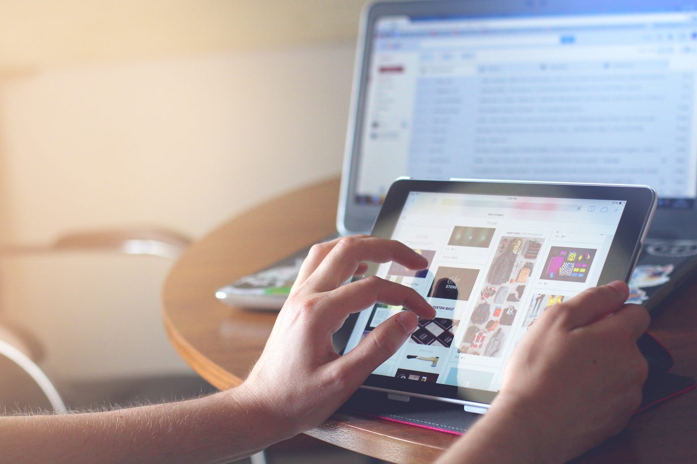 Person using an online platform on a tablet